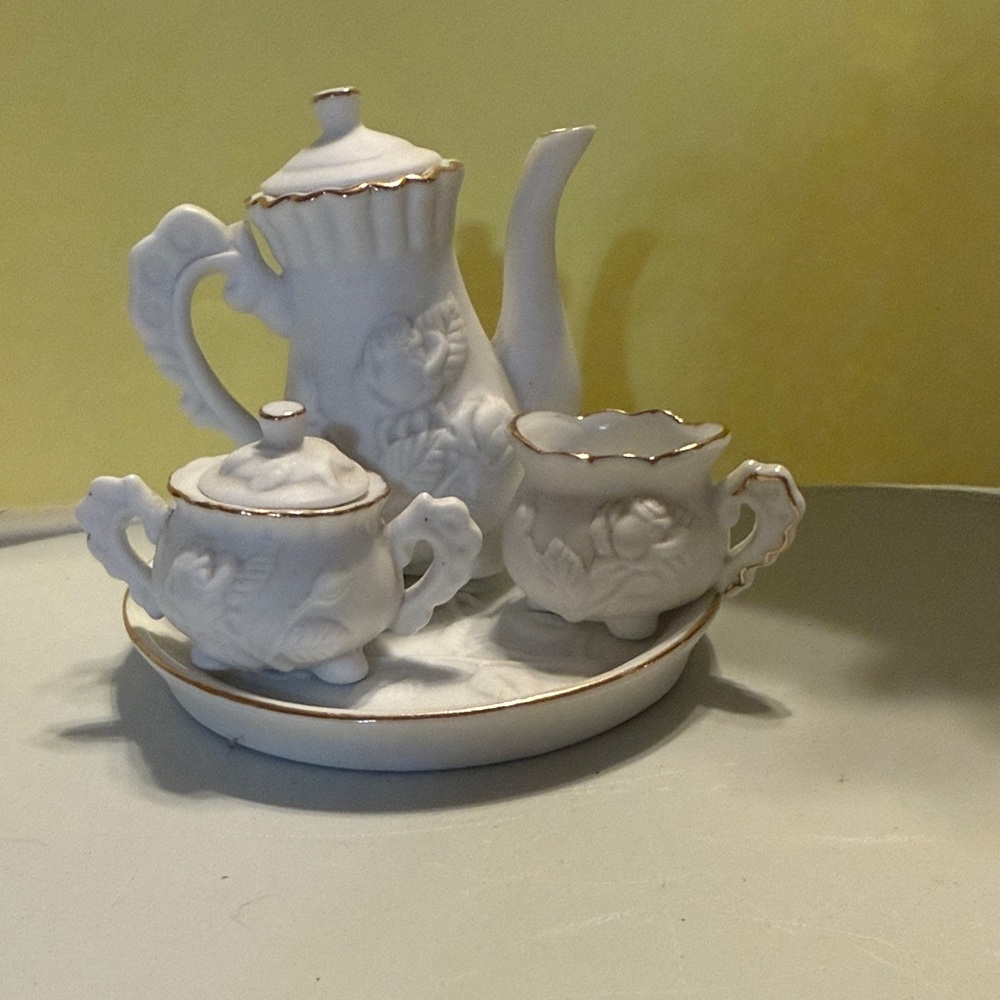 Elegant White Tea Set with Gold Trim